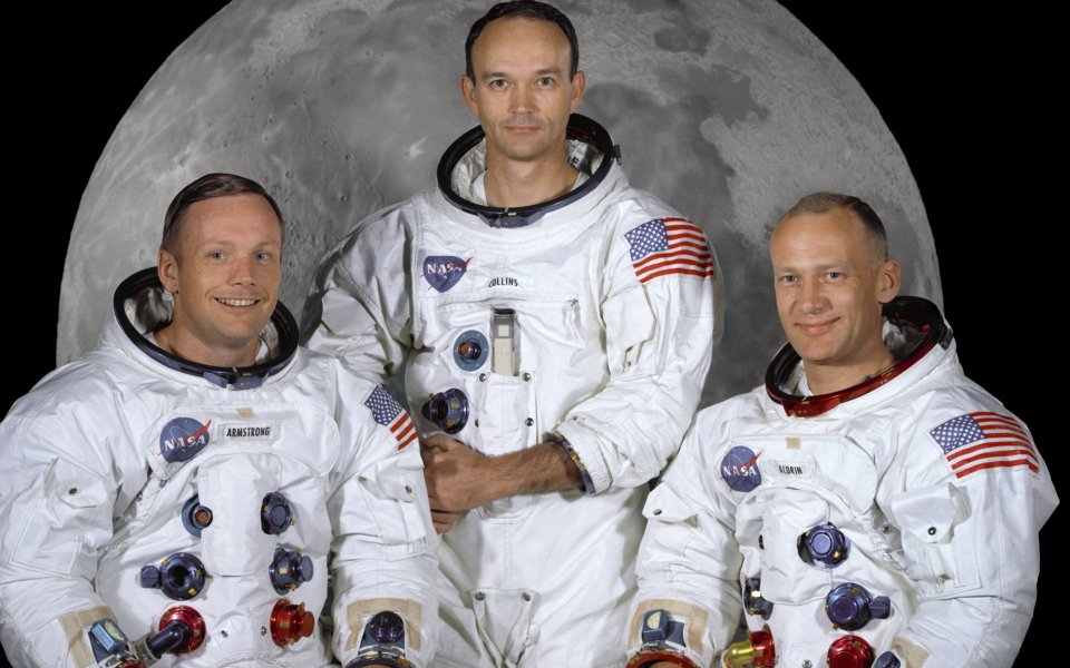 Apollo 11 Astronauts With Moon Background
