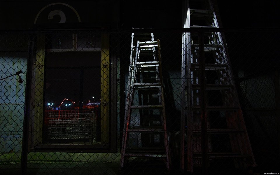 Yokohama Night Scene With Chain Link Fence And Ladders