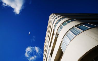 Blue Sky Above The City And Skyscraper