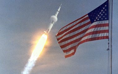 Apollo Program Rocket Launch With American Flag