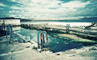 Lomo Style Derelict Pool And Seascape