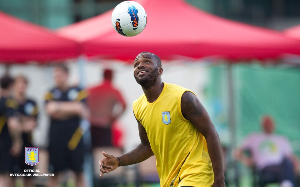 Aston Villa Football Player Heading Ball Training Official Wallpaper