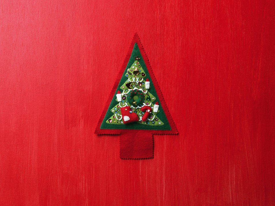 Green Felt Christmas Tree On Red Background