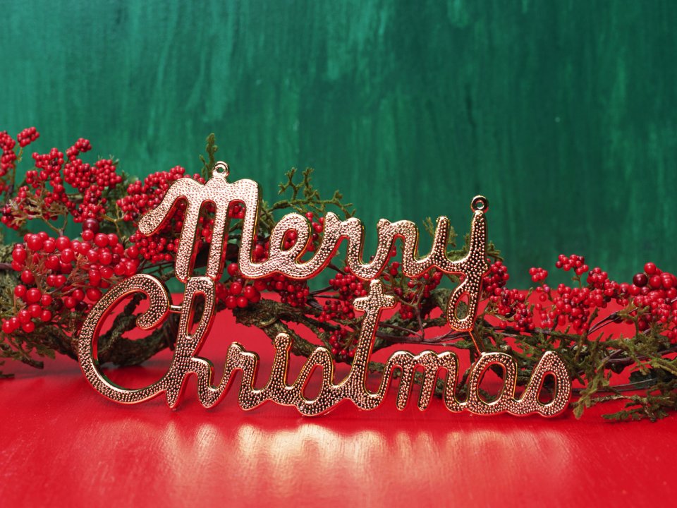 Golden Merry Christmas Letters With Red Berries