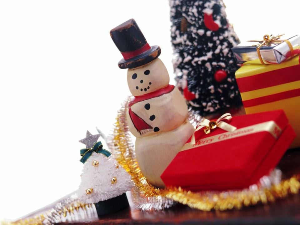 Wooden Snowman And Red Christmas Gifts