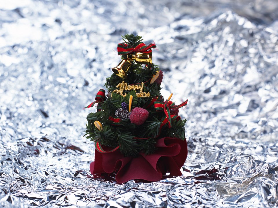Miniature Christmas Tree Gold Bells Tinfoil Background
