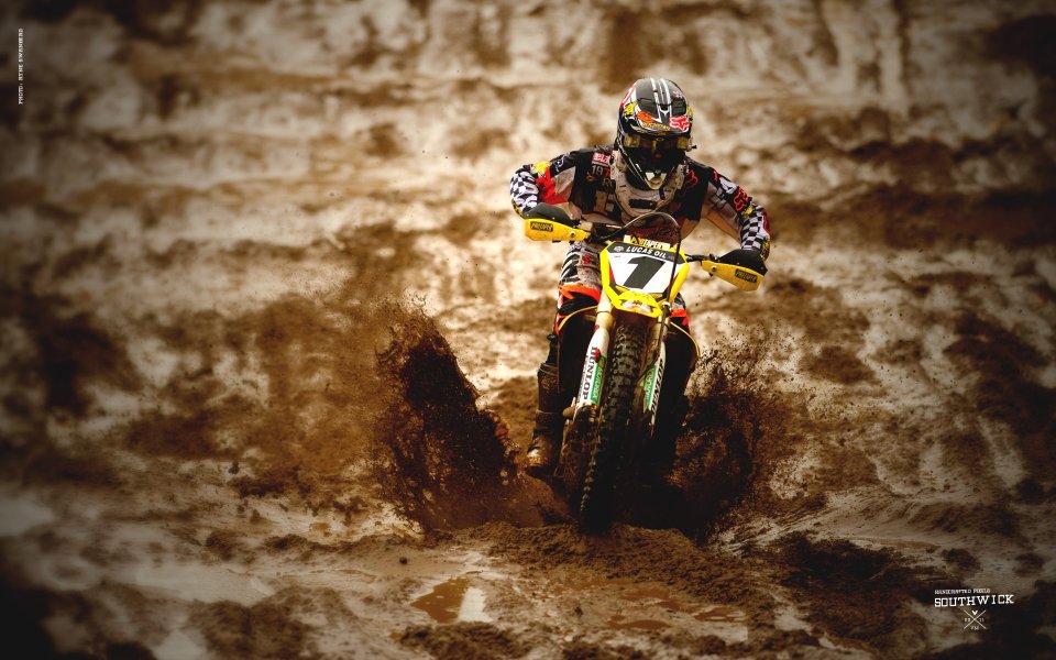 Motocross Rider On Muddy Track Racing Scene