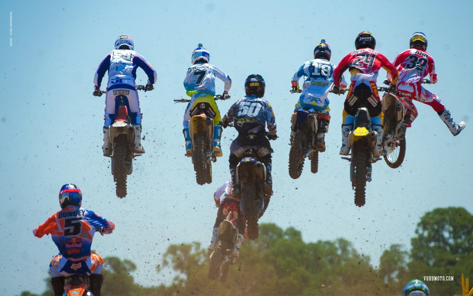 American Hangtown Motocross Riders Jumping Moment
