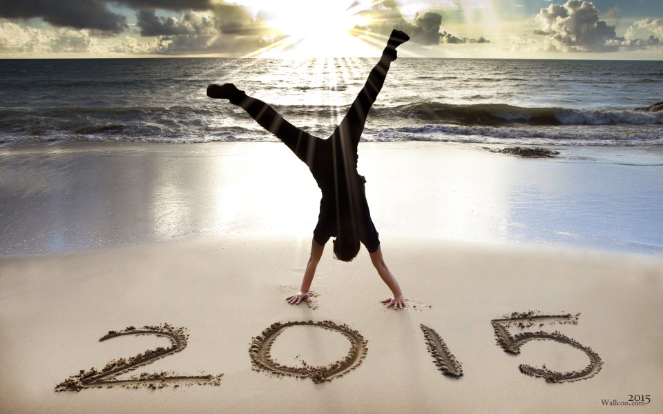 Handstand Celebrating 2015 On Beach Sunset