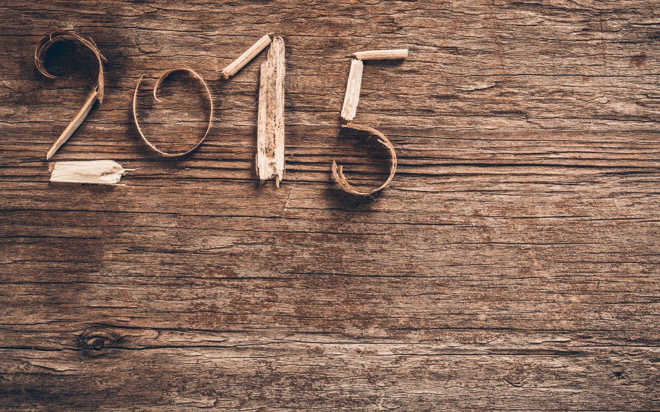 复古木质背景上的2015新年数字艺术
