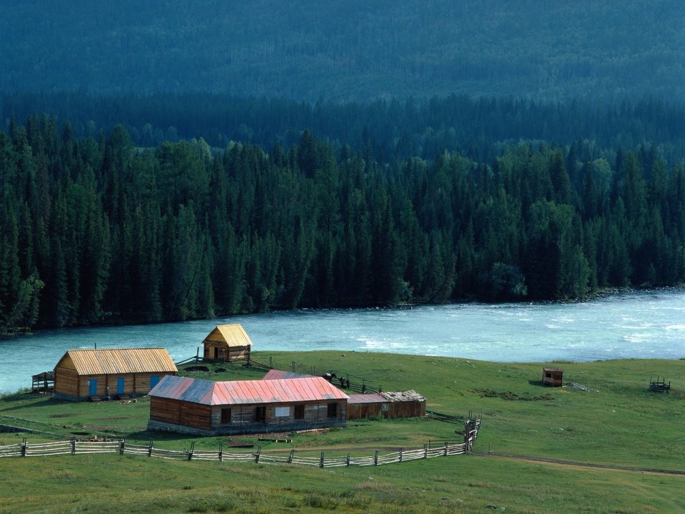 China Xinjiang Hemu Riverside Log Cabin Landscape