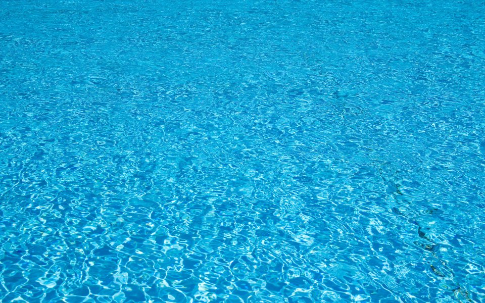 Clear Blue Swimming Pool Water Surface Ripples