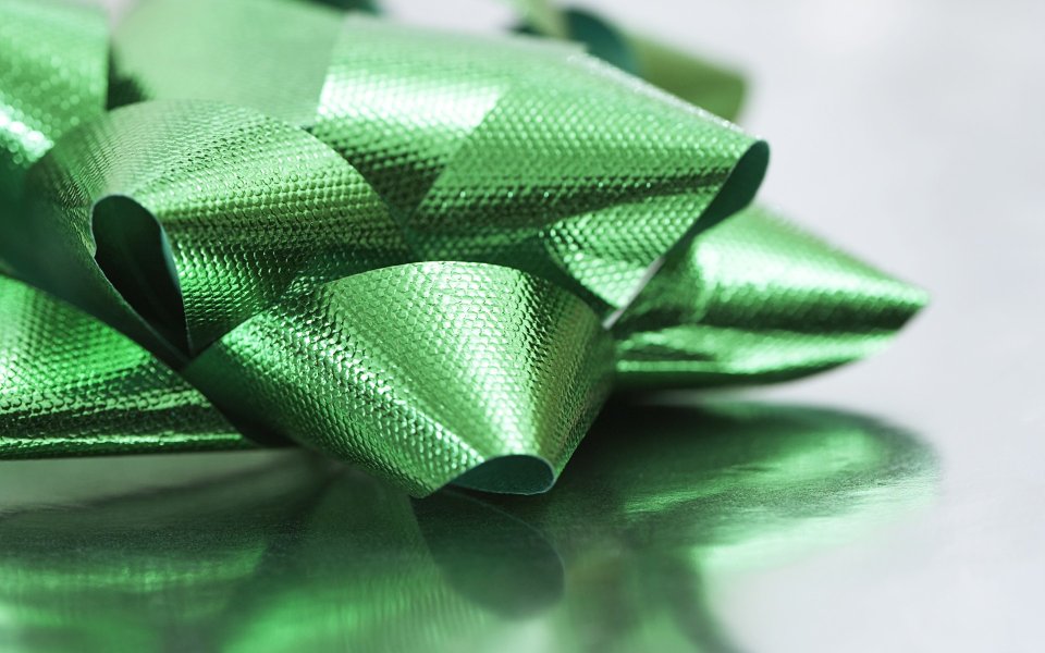 Green Metallic Bow Christmas Gift Closeup