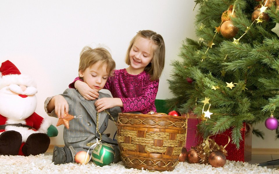 Siblings Decorating Christmas Tree Basket