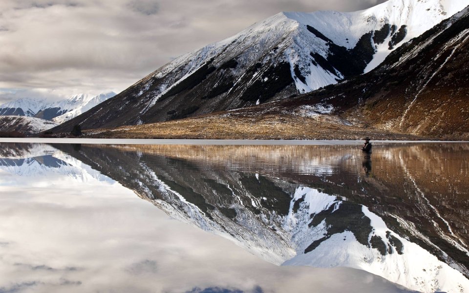 Fisherman Reflection Lake Pearson New Zealand