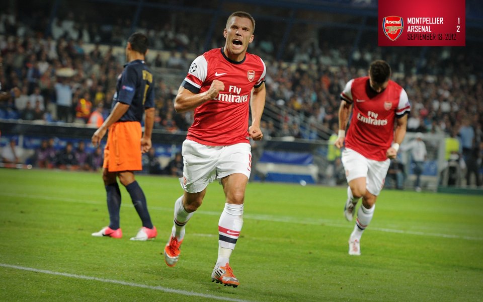 Arsenal Player Celebrating Goal In 2012 Champions League Match Against Montpellier