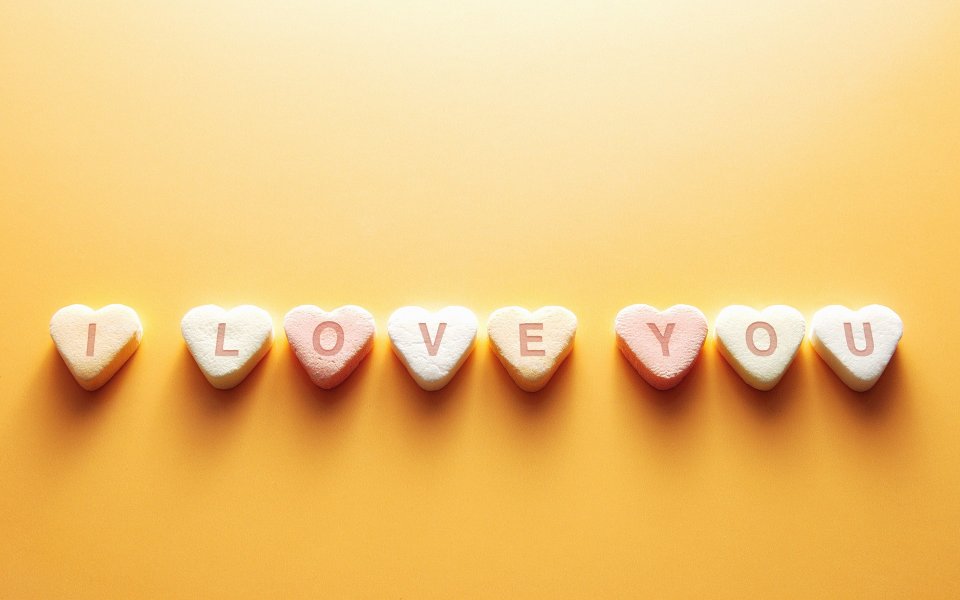 Heart Candy Spells I Love You On Yellow Background