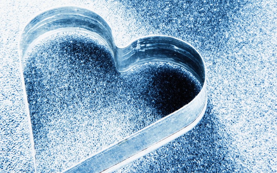 Heart Shaped Metal Mold On Blue Frost Texture