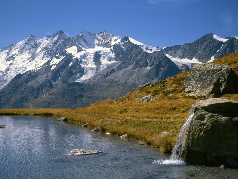 Kreuzboden Lake And Mischabel Range Switzerland
