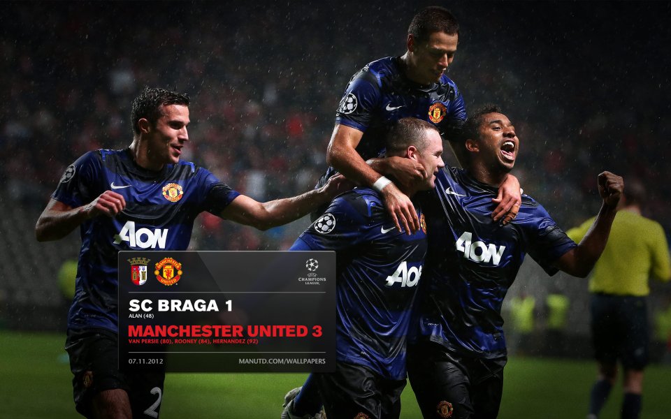 Manchester United Players Celebrate Victory In Rainy Champions League Match Vs SC Braga