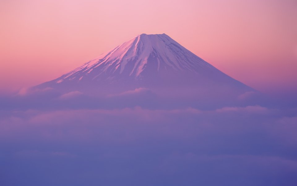 Mount Fuji At Sunrise Over Pink Purple Sea Of Clouds