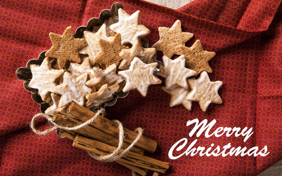 Star Shaped Gingerbread Cookies And Cinnamon Sticks