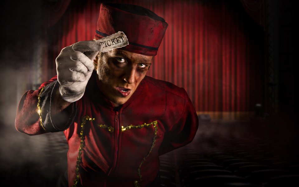 Horror Clown Holding Theater Ticket
