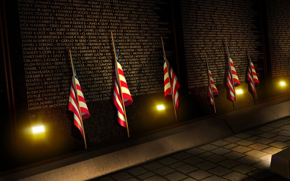 US Flags At Vietnam Veterans Memorial Wall
