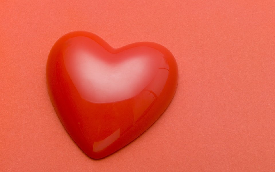 Red Glossy Heart Candy Texture Closeup