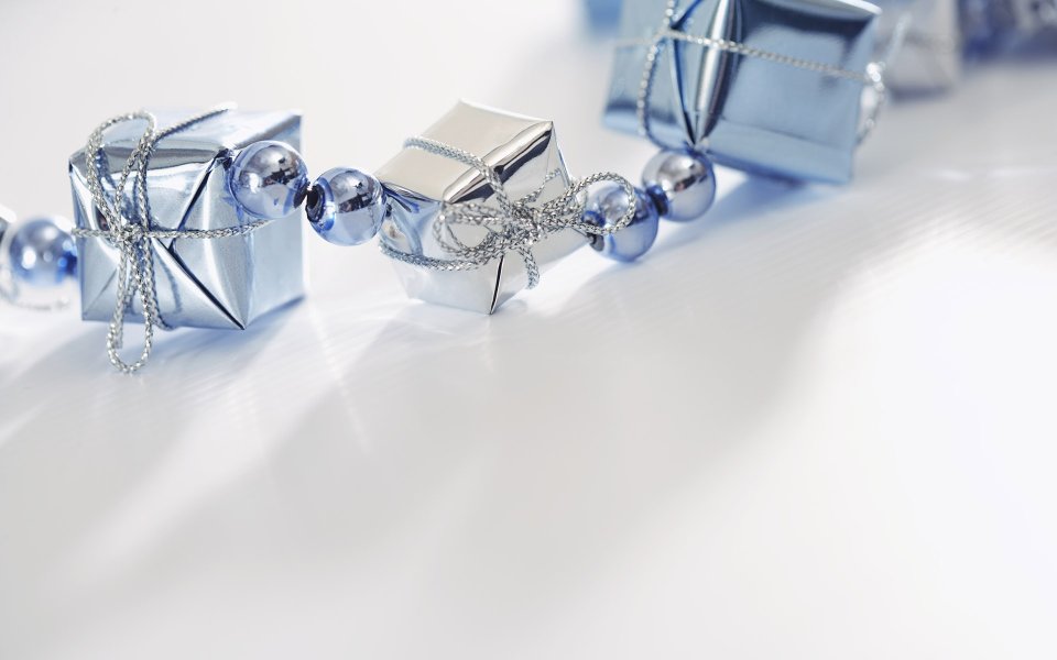 Blue Christmas Gifts Silver Ornaments White Background