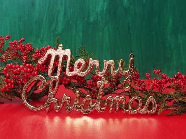 Golden Merry Christmas Letters With Red Berries