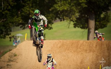 Motocross Rider Jumping Dirt Track Scene