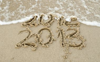 Waves Washing Away 2013 Written In Sand