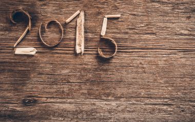 复古木质背景上的2015新年数字艺术