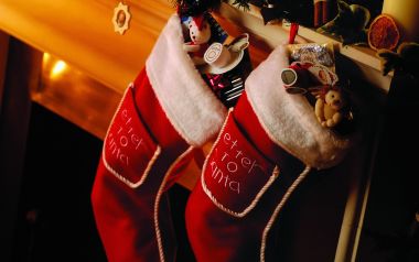 Close Up Of Red Christmas Stocking On Fireplace