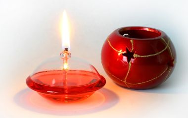 Red Glass Oil Lamp And Christmas Ornament Still Life