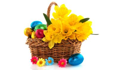 Wicker Basket With Daffodils And Easter Eggs