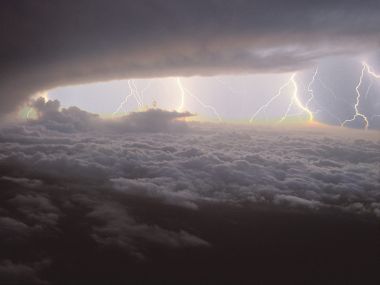 Electrical Storm Lightning Above High Altitude Cloud Sea