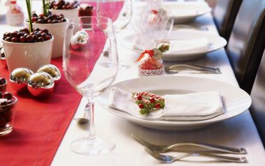 Cozy Christmas Table Setting With Cranberries