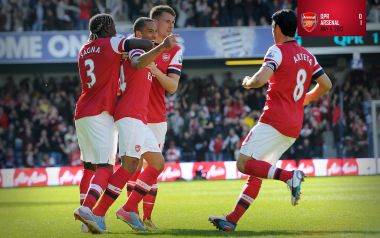 Arsenal Players Celebrating Goal Against QPR In 2013