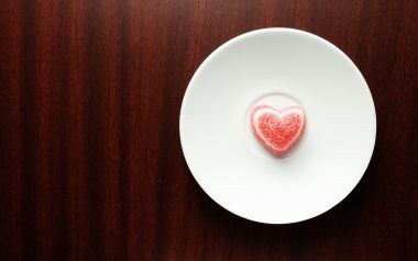Red Heart Candy On White Plate Wooden Table