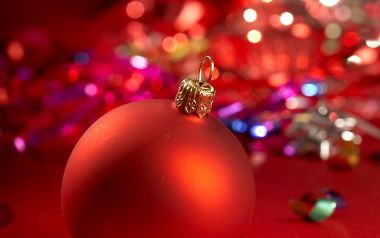 Close Up Of Red Matte Christmas Ornament With Bokeh