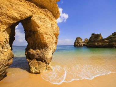Portugal Algarve Shallow Water Coastal Rock Arch Scenery