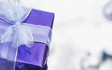 Purple Gift Box Blue Ribbon Closeup