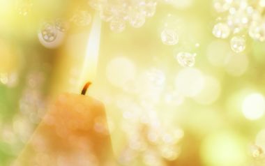 Warm Candlelight Close Up With Dreamy Bokeh Background