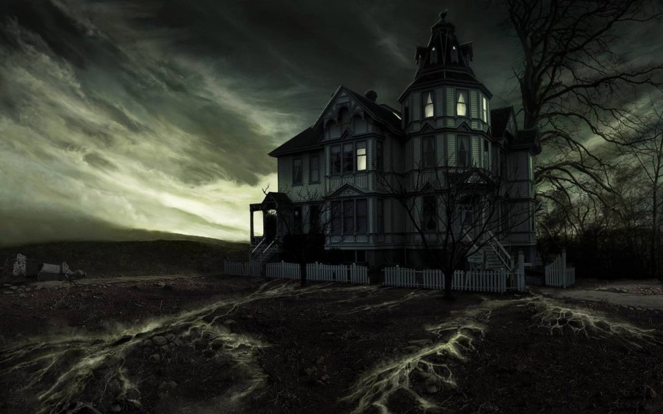 Spooky Gothic Abandoned Mansion Under Eerie Night Sky