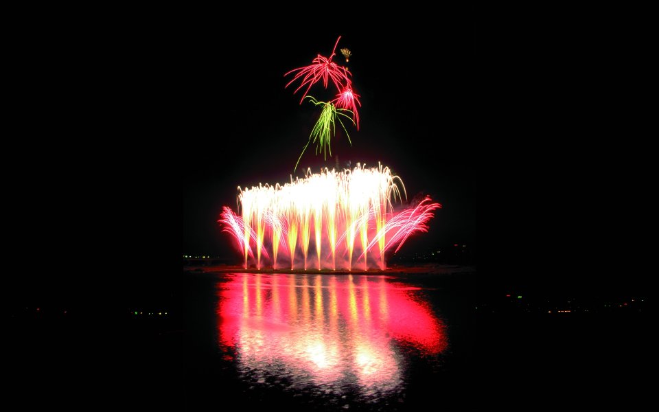 Festive Lake Fireworks Show Night Scene