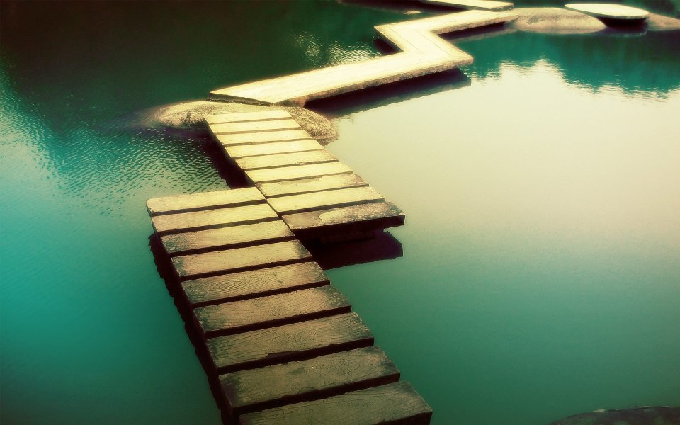 Vintage Scenery Of Z Shaped Wooden Walkway On Turquoise Lake