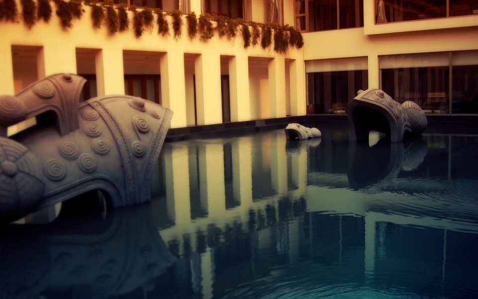 Warm Light Southeast Asia Resort Pool Stone Sculpture View