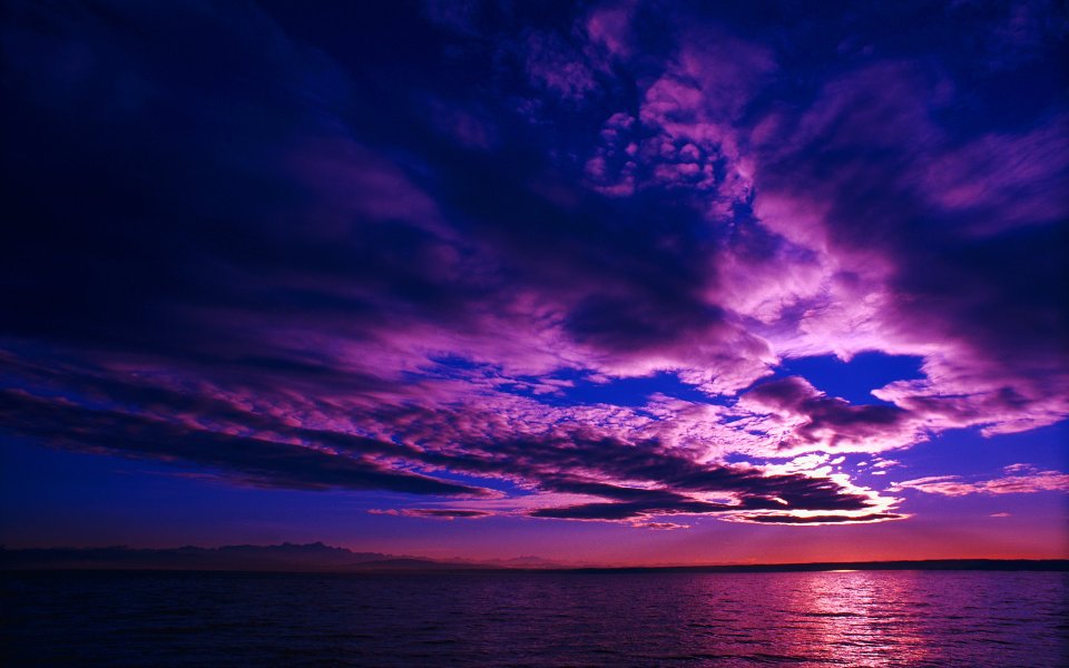 梦幻紫霞海面日落黄昏自然景观